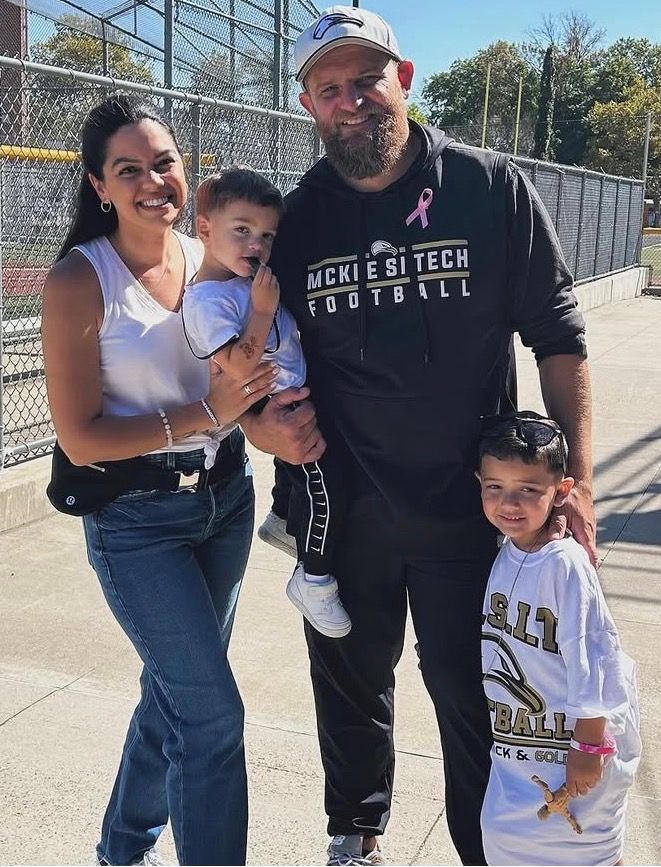 App with his wife Christina and their sons